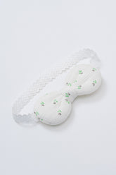 Avauma Petite Garden Baby Headband in Mint Garden with green floral embroidery on white ribbed fabric and lace elastic band